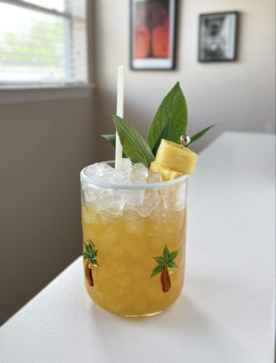 This drink was inspired by an impending beach vacation, wanting to pack a ton of tropical flavor into one drink. Between the pineapple, passionfruit, coconut, and wonderful spice notes from The Bitter Truth's golden falnerum (gifted), this is vacation in a glass.